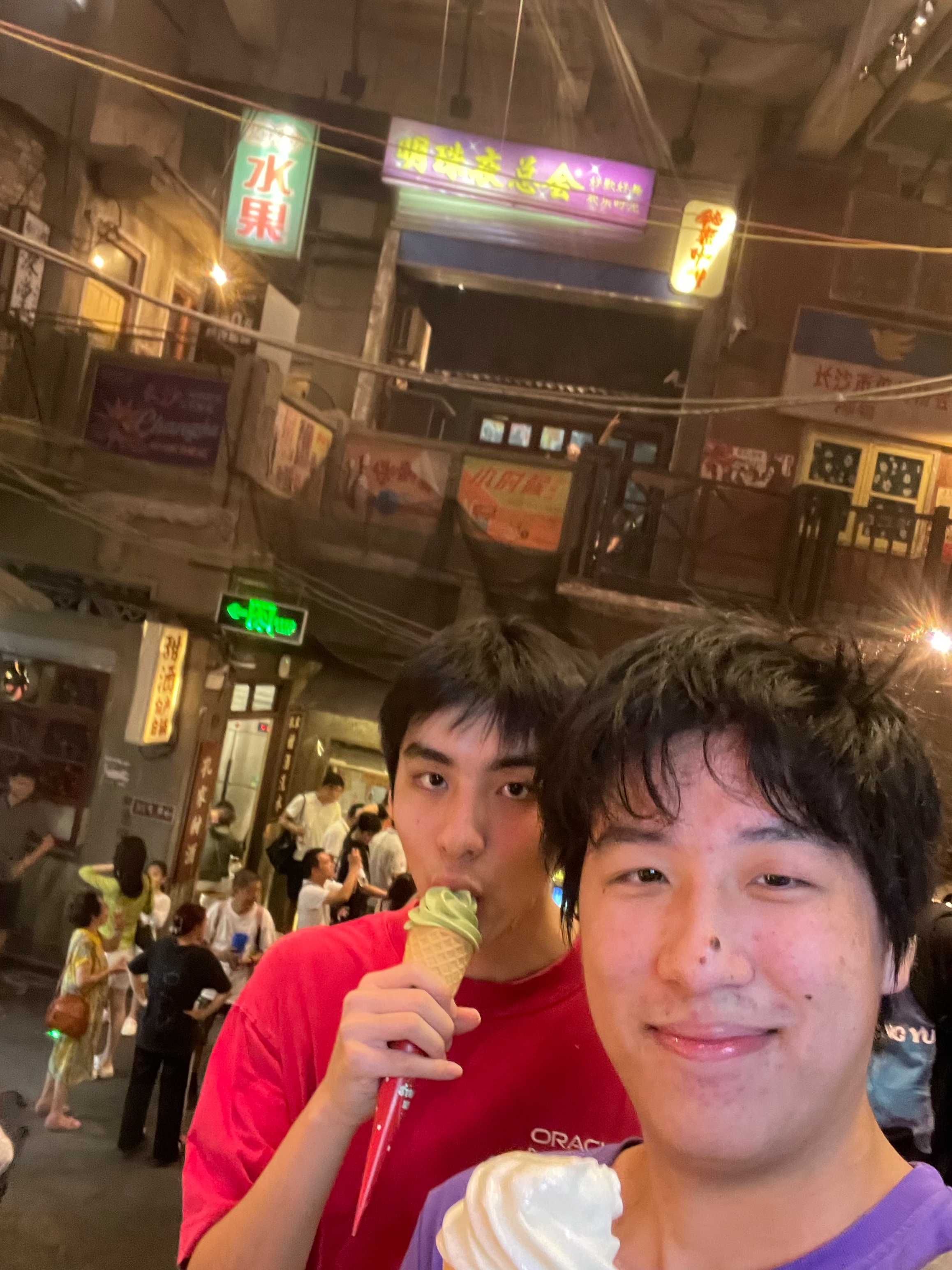 Forest Wu eating ice cream with a friend
