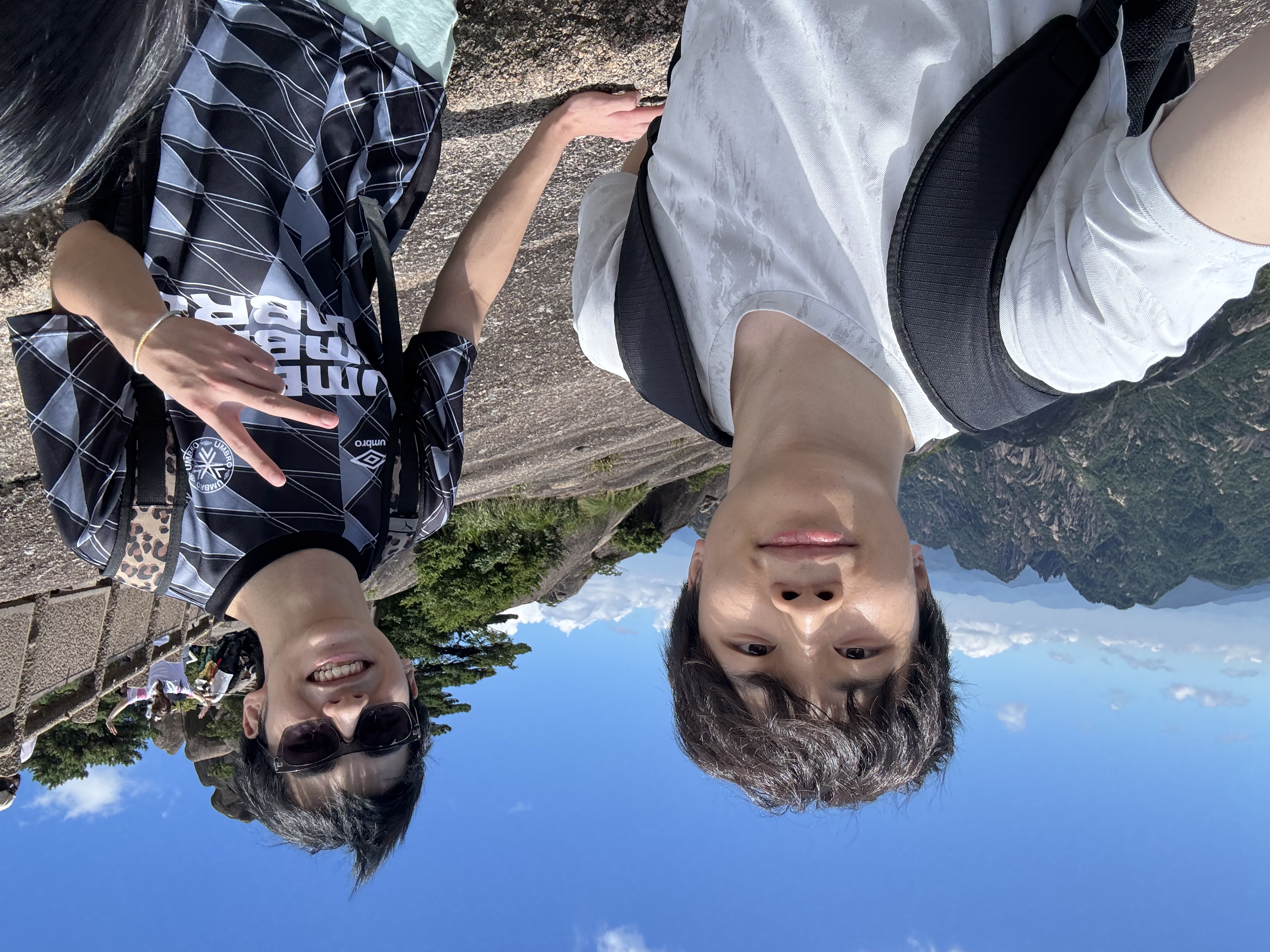 Forest Wu hiking with a friend