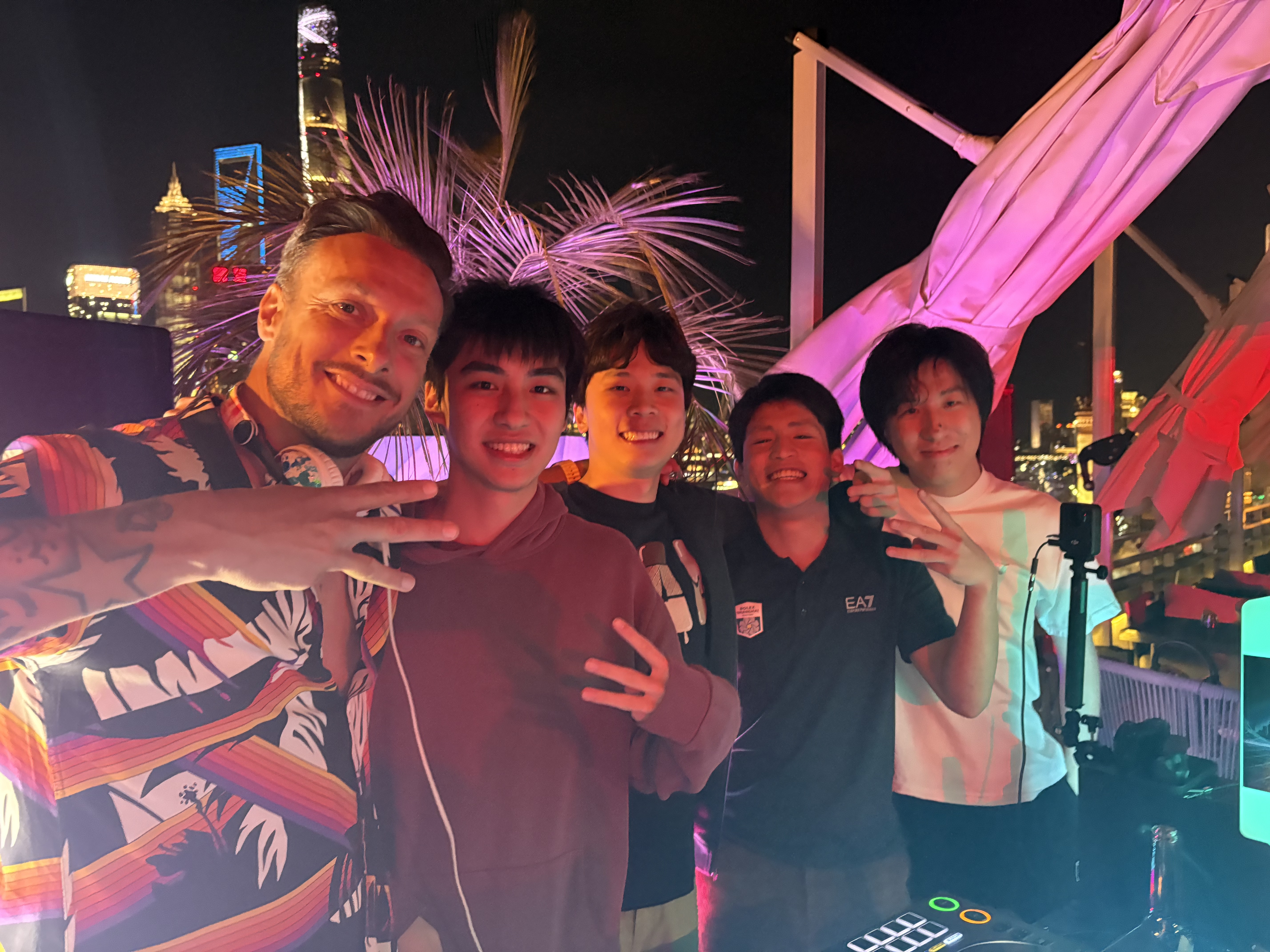 Forest Wu with friends at night
